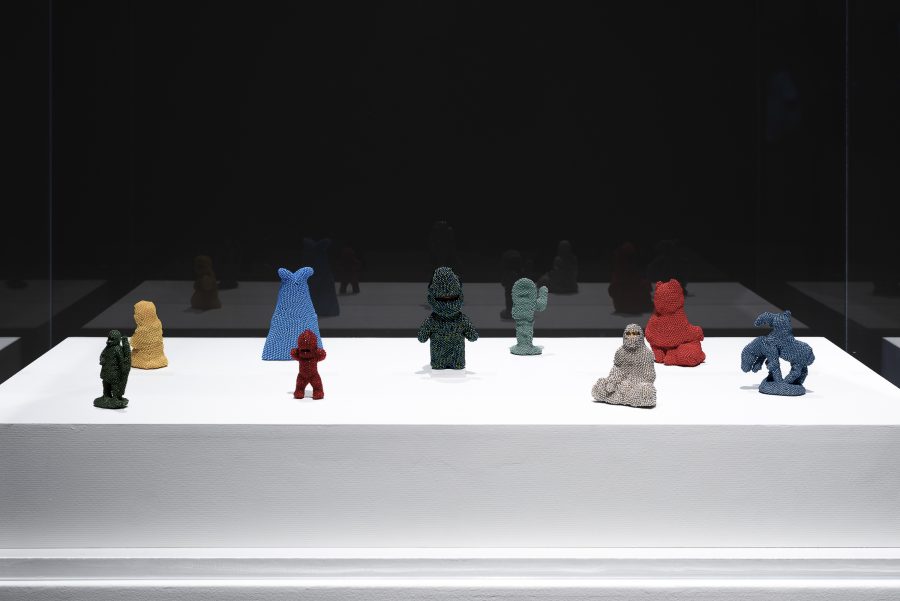 Multi coloured beaded figurines. 