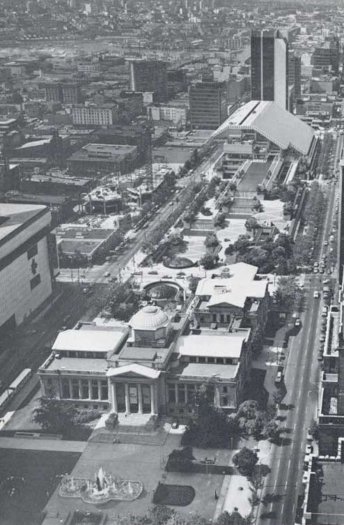 Greyscale aerial view of the Vancouver Art Gallery, Robson Square, and Law Courts.