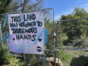 The Sogorea Te’ Land Trust was given a community garden on Ashby Avenue in Berkeley, California in 2022 by the family of a UC Berkeley student who wanted to return Ohlone land to Indigenous stewardship. Image courtesy of Zac Farber/Berkeleyside.