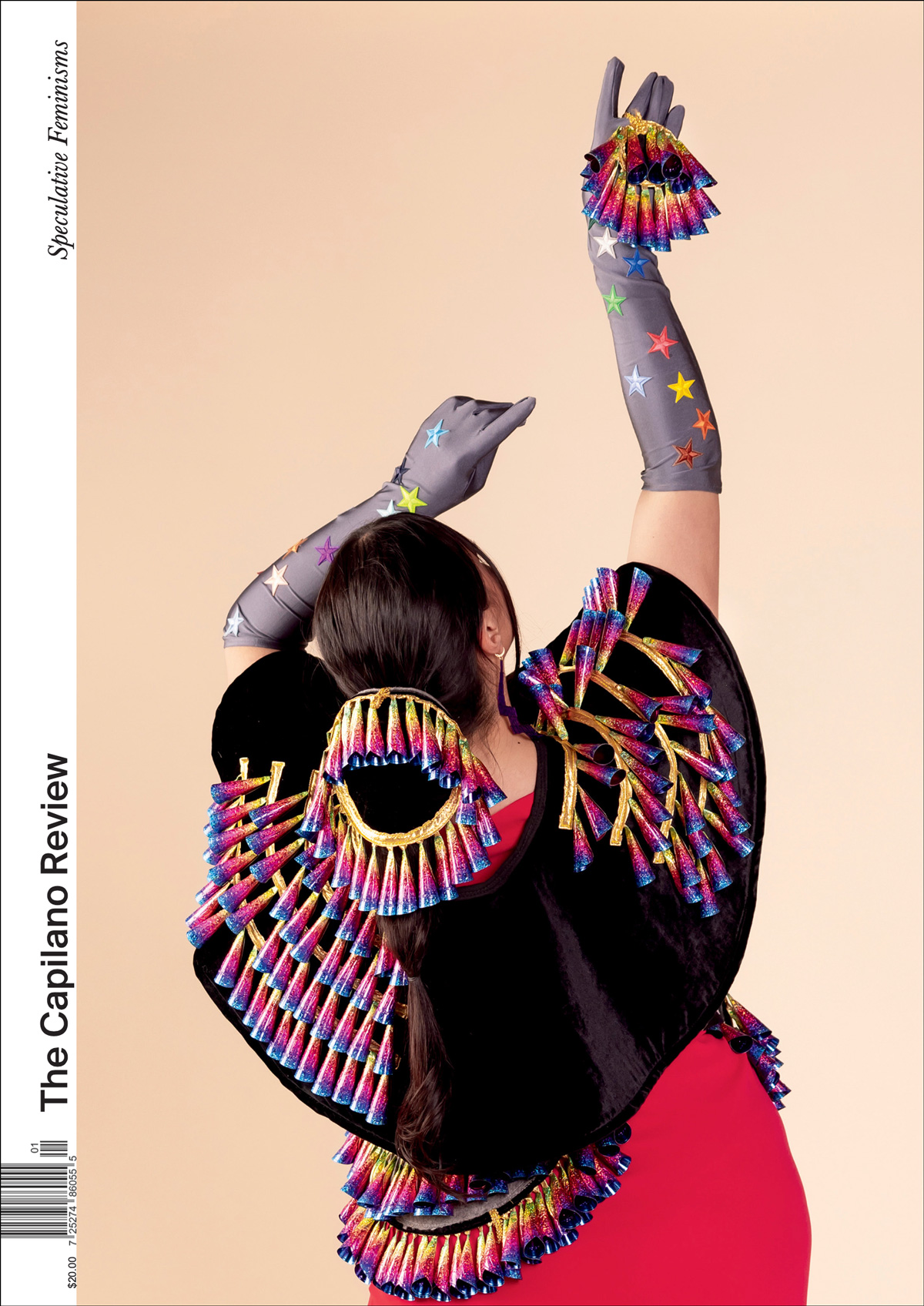 Maria Hupfield, A’ngelee Clause wearing My Body Dances to the Sound of a Rainbow Blossom (Rainbow Jingle Cape), 2024, tin jingles, industrial felt, velvet. Photo by Tira Howard Photography. Image courtesy of the artist and Patel Brown, Toronto.