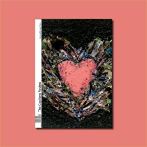 The image shows the cover of The Capilano Review's latest issue, Carcerality and Care, with the publication title and barcode along the spine. The issue cover is a photo of an artwork by Angelee Porter. In the ground lies a heart-shaped nest created from shredded photographs, expanding outward from a pink beaded heart that lies in the centre. The issue is surrounded by a soft pink background, matching the colour of the heart.